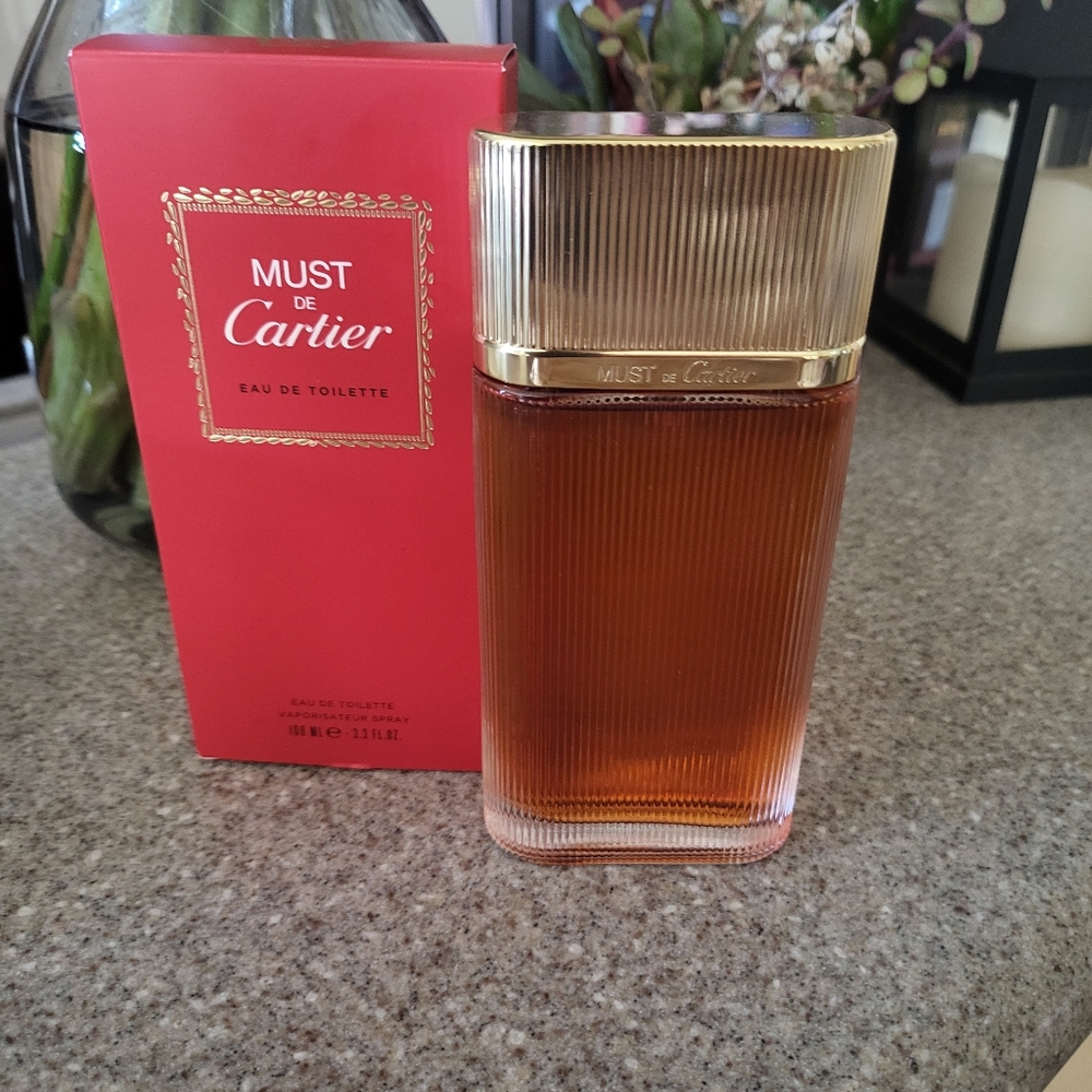 Cartier perfume original in box and wrapping.